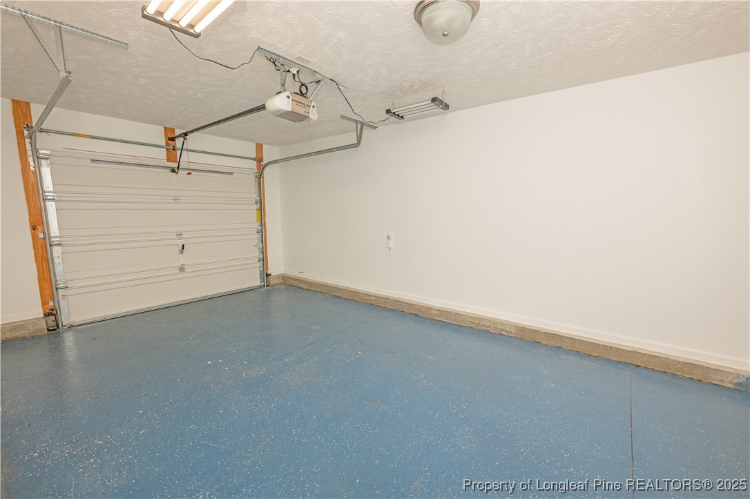 2112 Yellowbrick Road Fayetteville, NC 28314 - Photo 40 of 48 a view of a room with racks on the wall