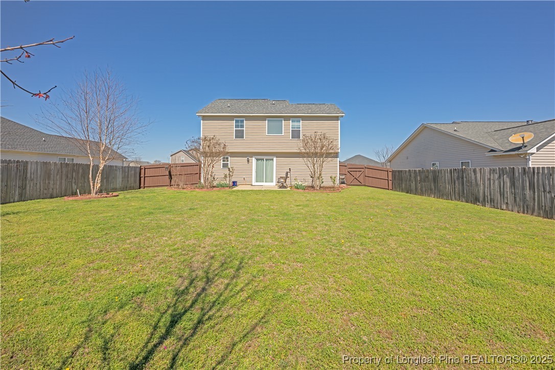 2112 Yellowbrick Road Fayetteville, NC 28314 - Photo 43 of 48 a house view with swimming pool in front of it