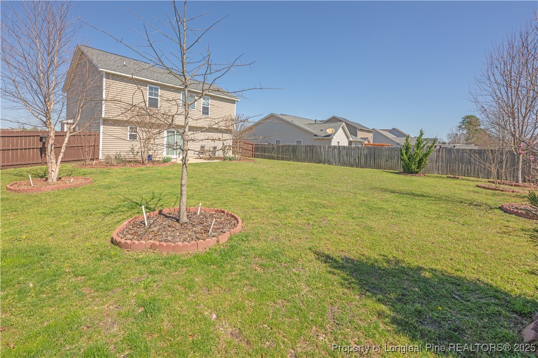 2112 Yellowbrick Road Fayetteville, NC 28314 - Photo 44 of 48 a view of a patio with a yard
