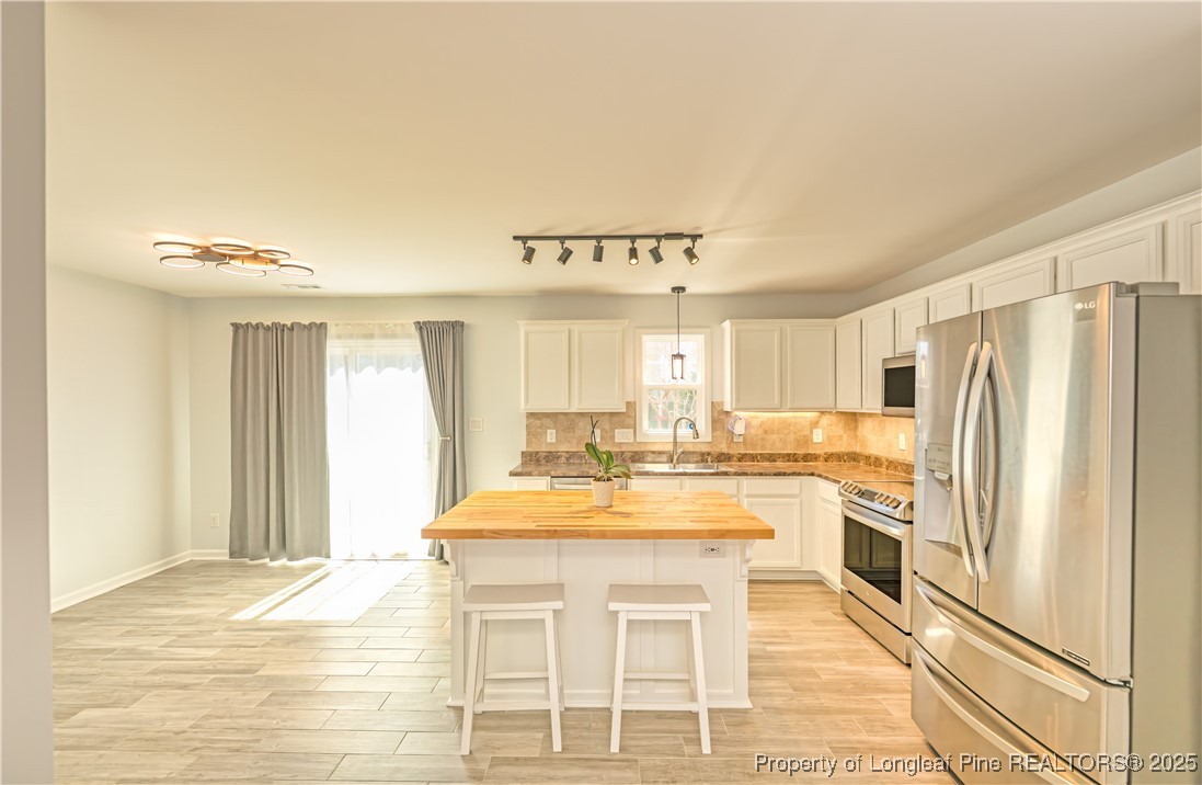 2112 Yellowbrick Road Fayetteville, NC 28314 - Photo 7 of 48 a very nice looking kitchen with a large window