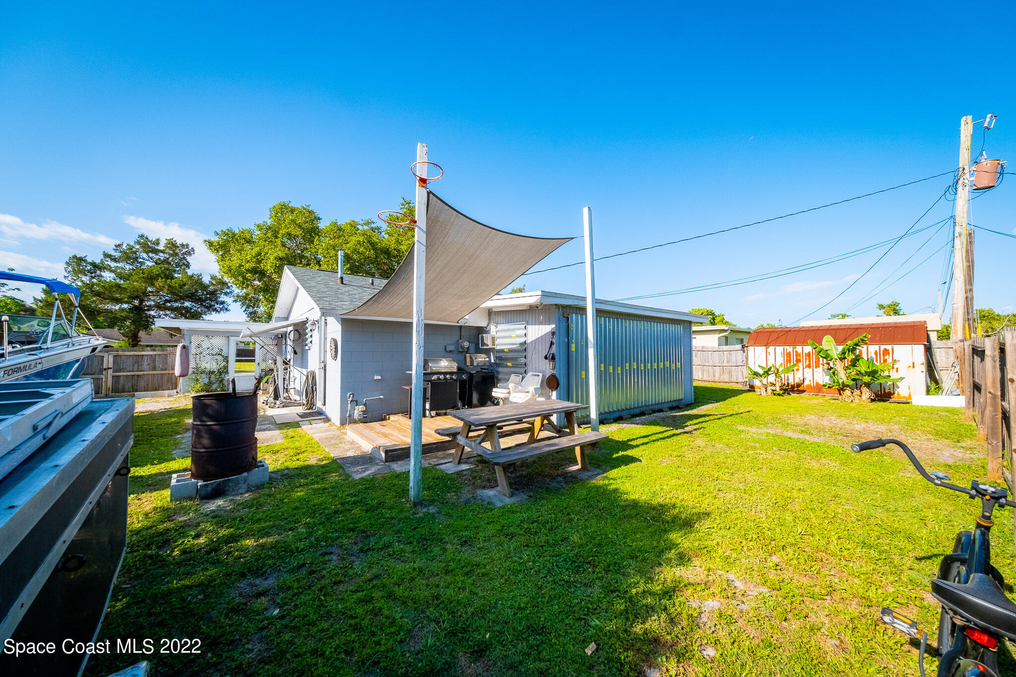 982 Cardon Drive Rockledge, FL 32955 - Photo 27 of 27 a view of a backyard with swimming pool
