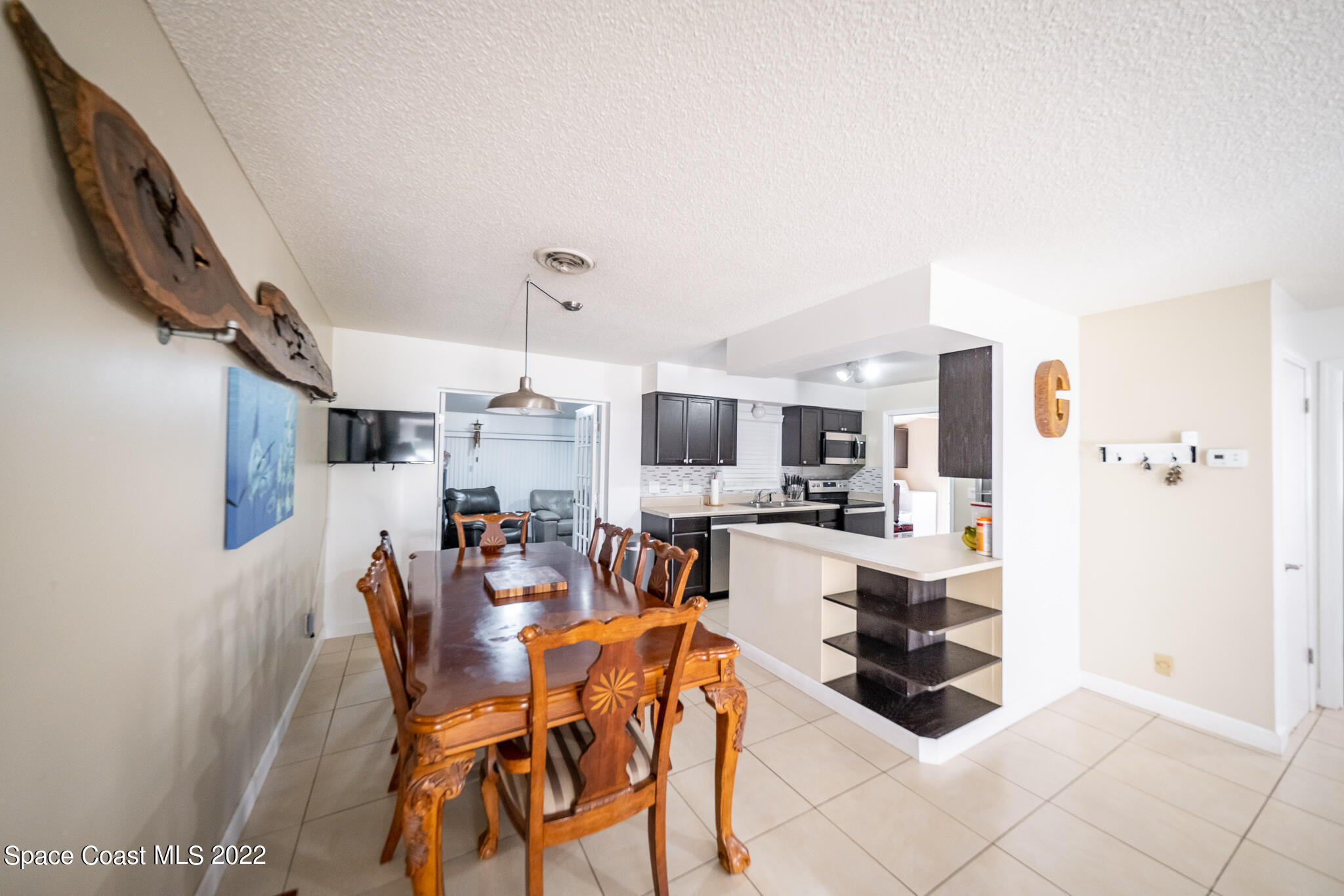 982 Cardon Drive Rockledge, FL 32955 - Photo 10 of 27 a view of a dining room with furniture