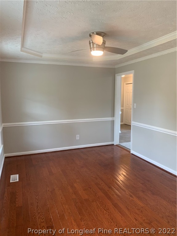 4520 Mobius Road Fayetteville, NC 28312 - Photo 3 of 29 a view of an empty room with wooden floor and a window