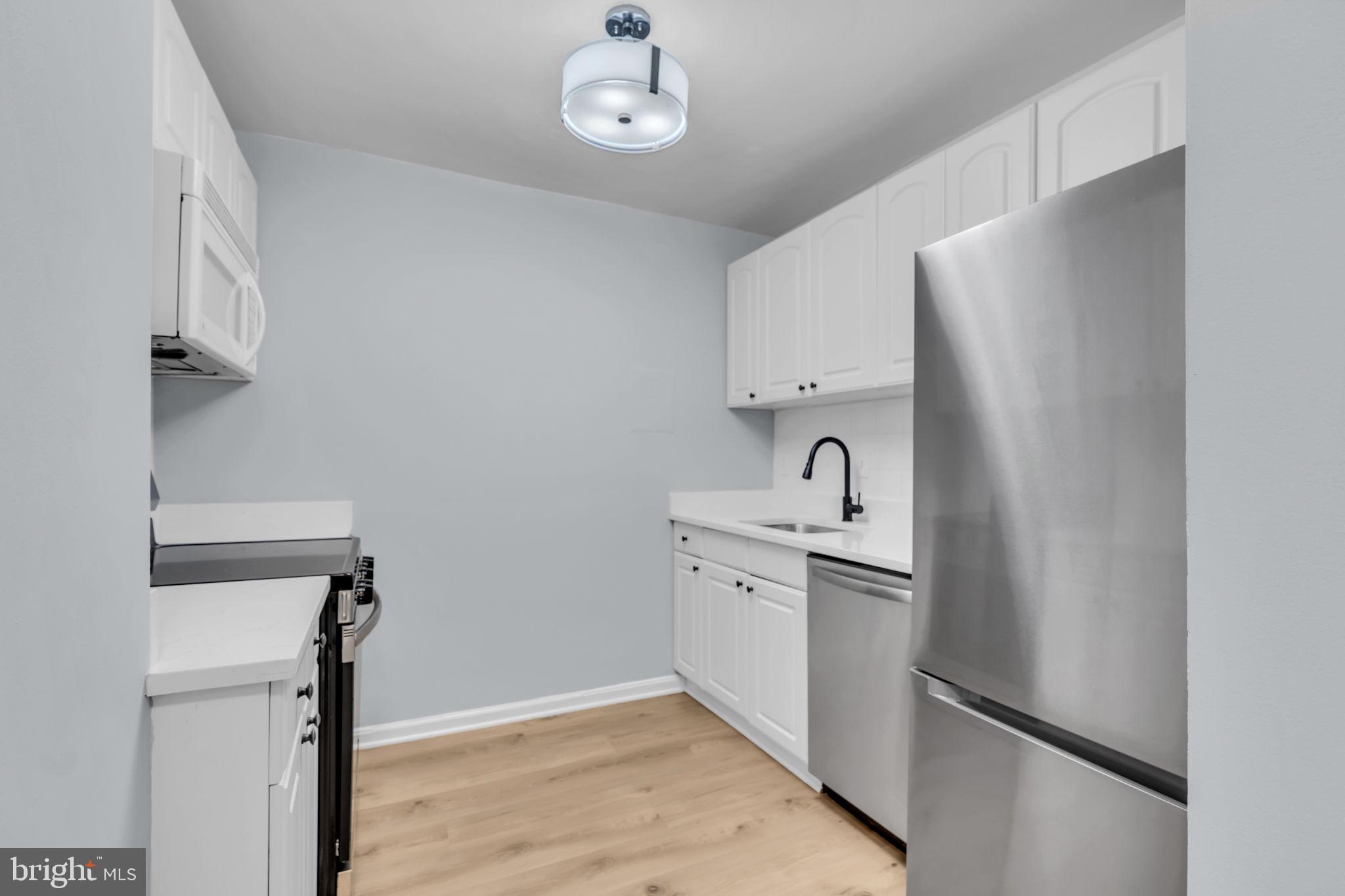 3245 Rio Drive, Unit 307 Falls Church, VA 22041 - Photo 3 of 29 new kitchen