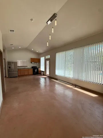 an empty room with windows