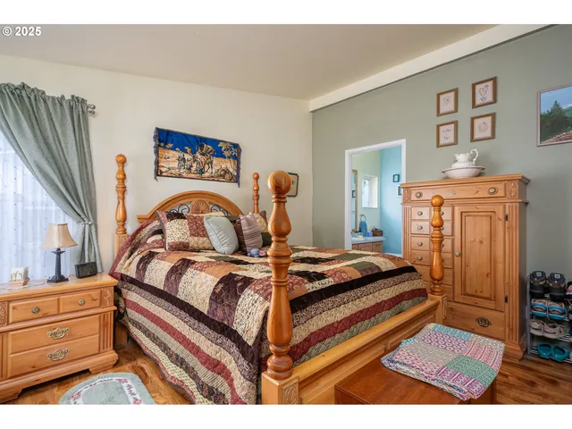 a bed room with a bed and a fish tank