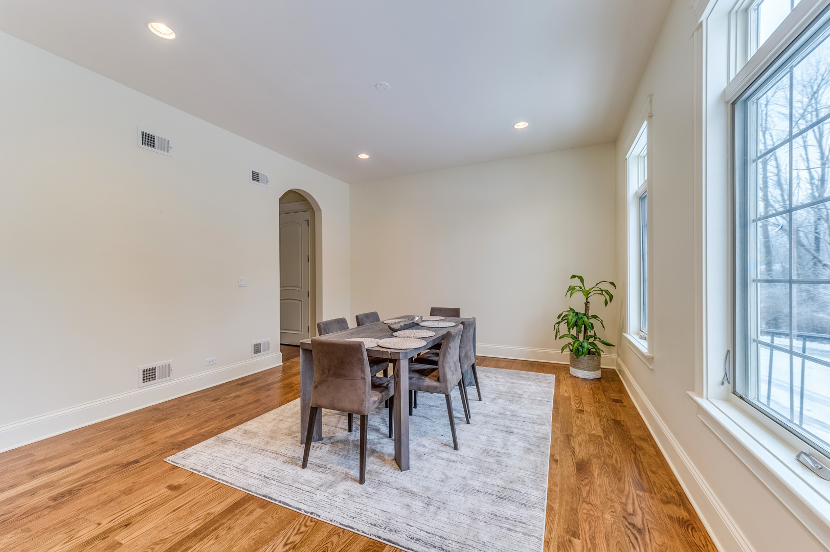 1450 Ridge Road Highland Park, IL 60035 - Photo 14 of 46 a view of a dining room with furniture window and wooden floor