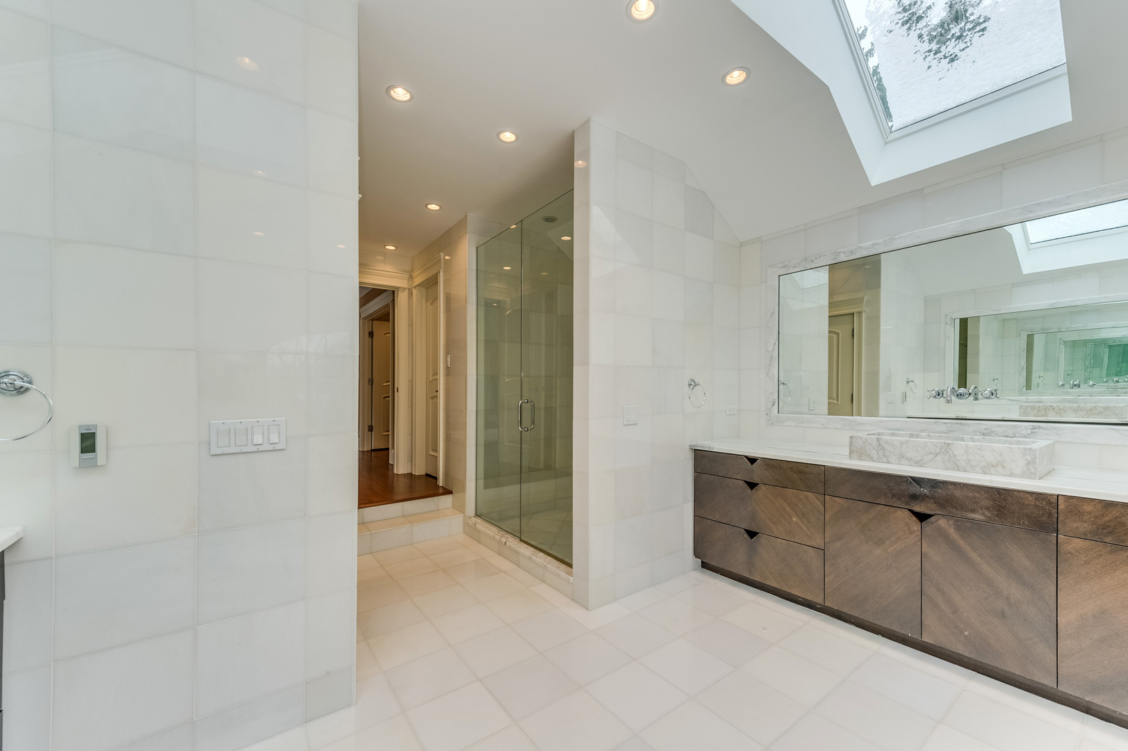 1450 Ridge Road Highland Park, IL 60035 - Photo 25 of 46 a bathroom with a double vanity sink and a mirror