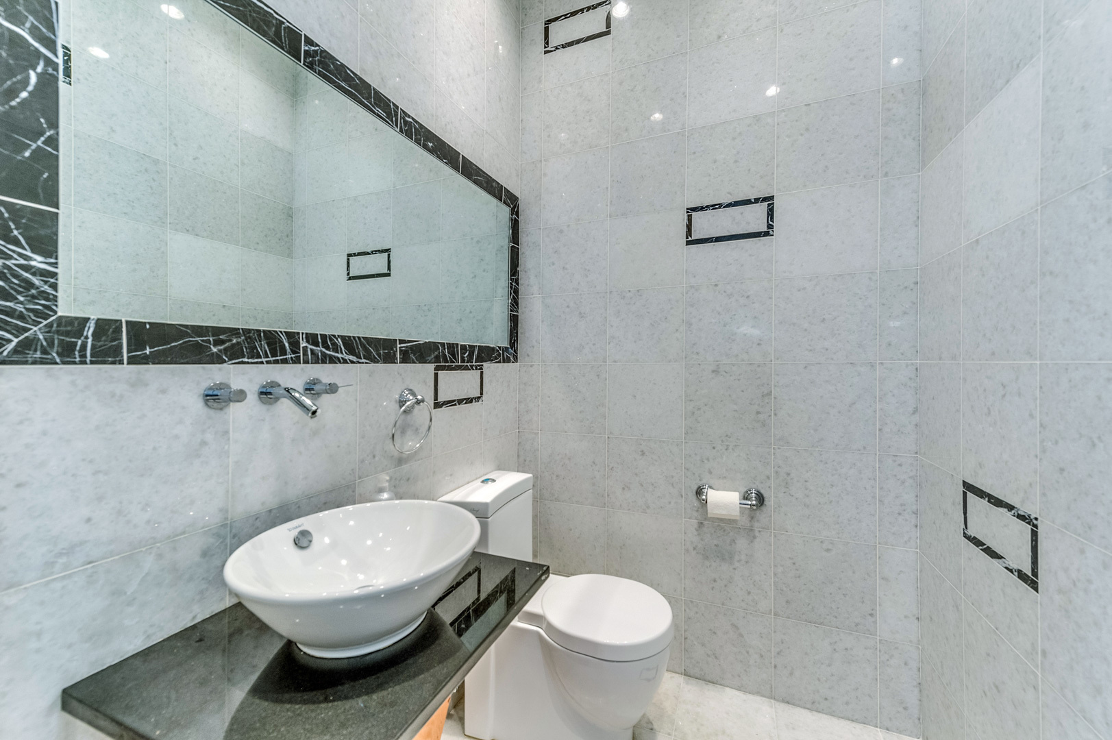 1450 Ridge Road Highland Park, IL 60035 - Photo 39 of 46 a bathroom with a toilet sink and mirror