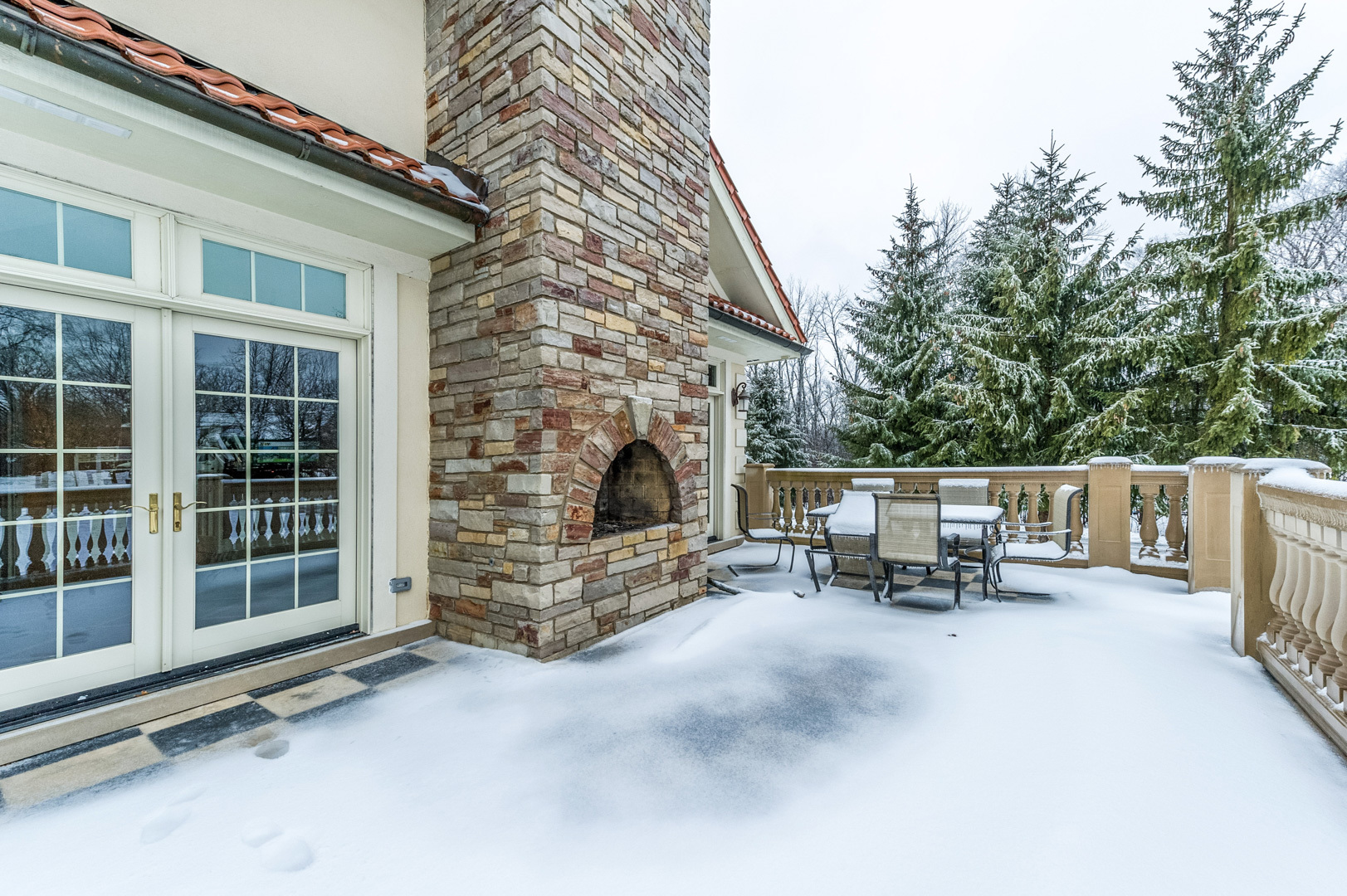 1450 Ridge Road Highland Park, IL 60035 - Photo 45 of 46 a roof deck with table and chairs and a barbeque