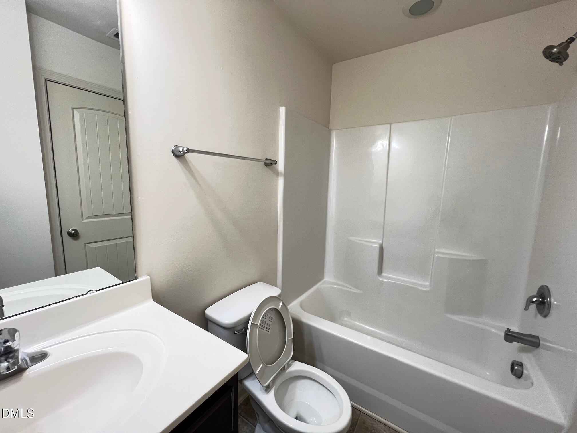 18 Rochambeau Court Durham, NC 27704 - Photo 12 of 12 a bathroom with a sink a toilet and shower