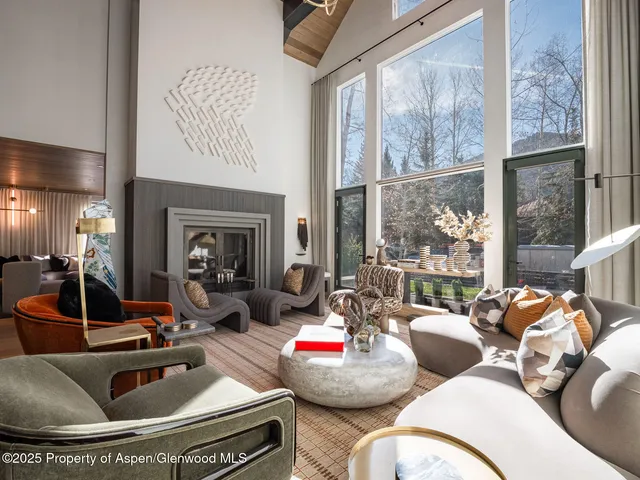 a living room with a couch and a table