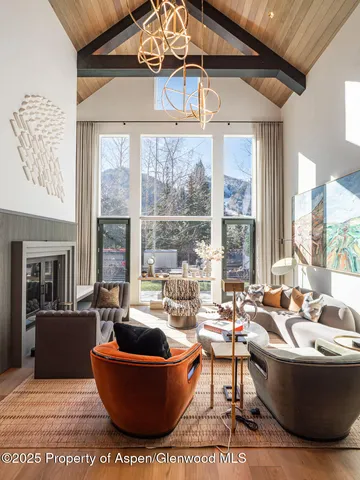 a kitchen with stainless steel appliances granite countertop a stove and a microwave