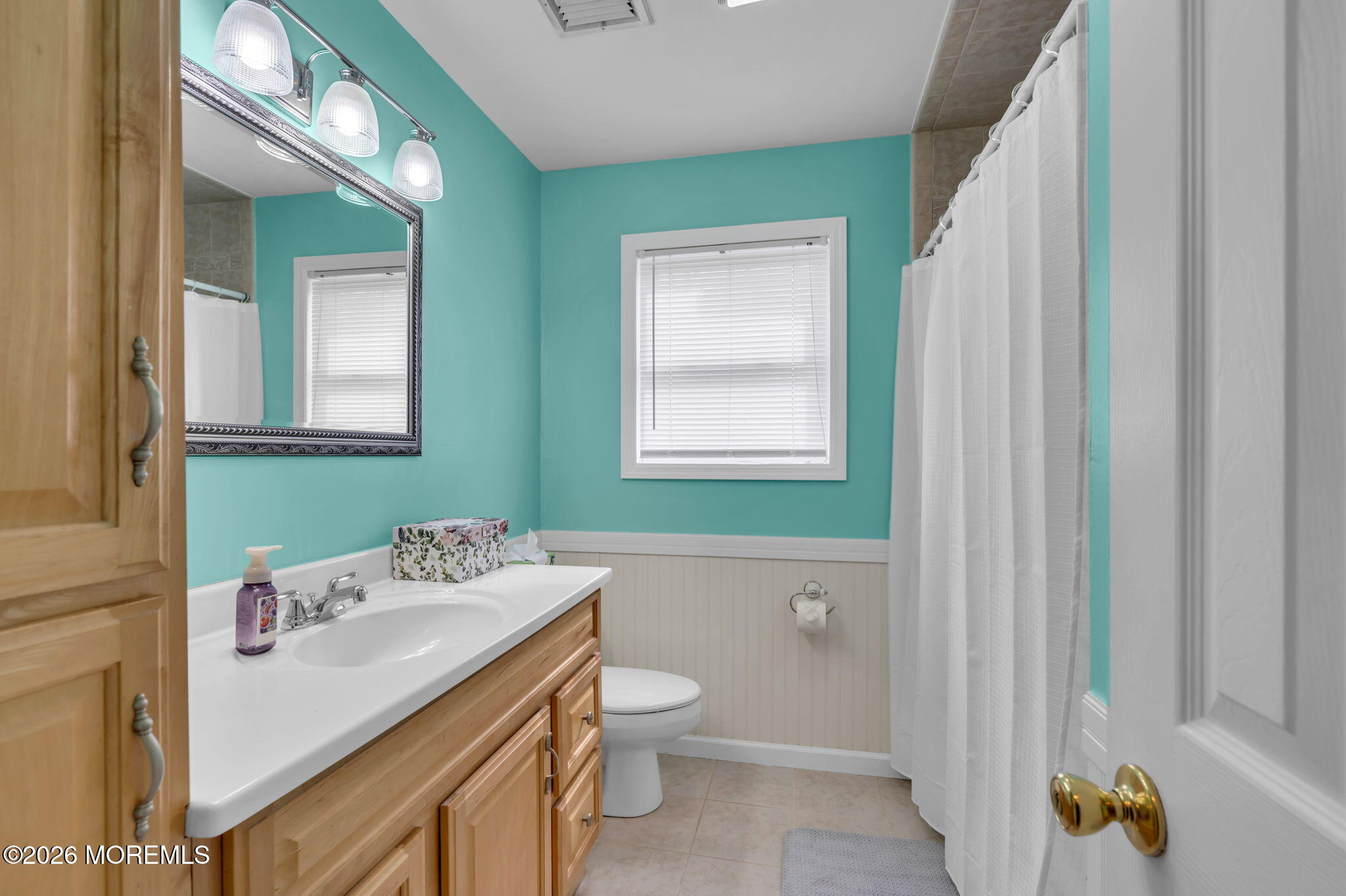 26 Clark Drive Howell, NJ 07731 - Photo 18 of 25 a bathroom with a sink toilet and a mirror