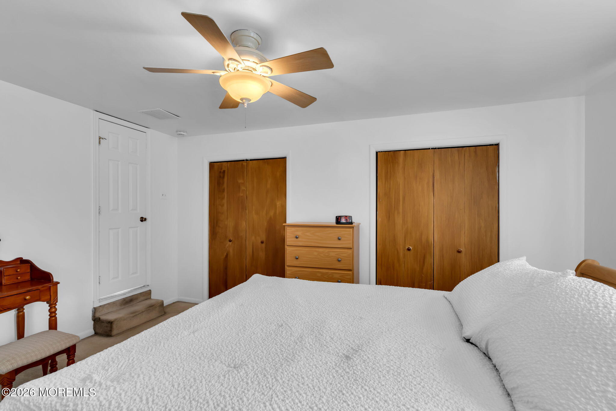 26 Clark Drive Howell, NJ 07731 - Photo 20 of 25 a bedroom with a bed and a dresser