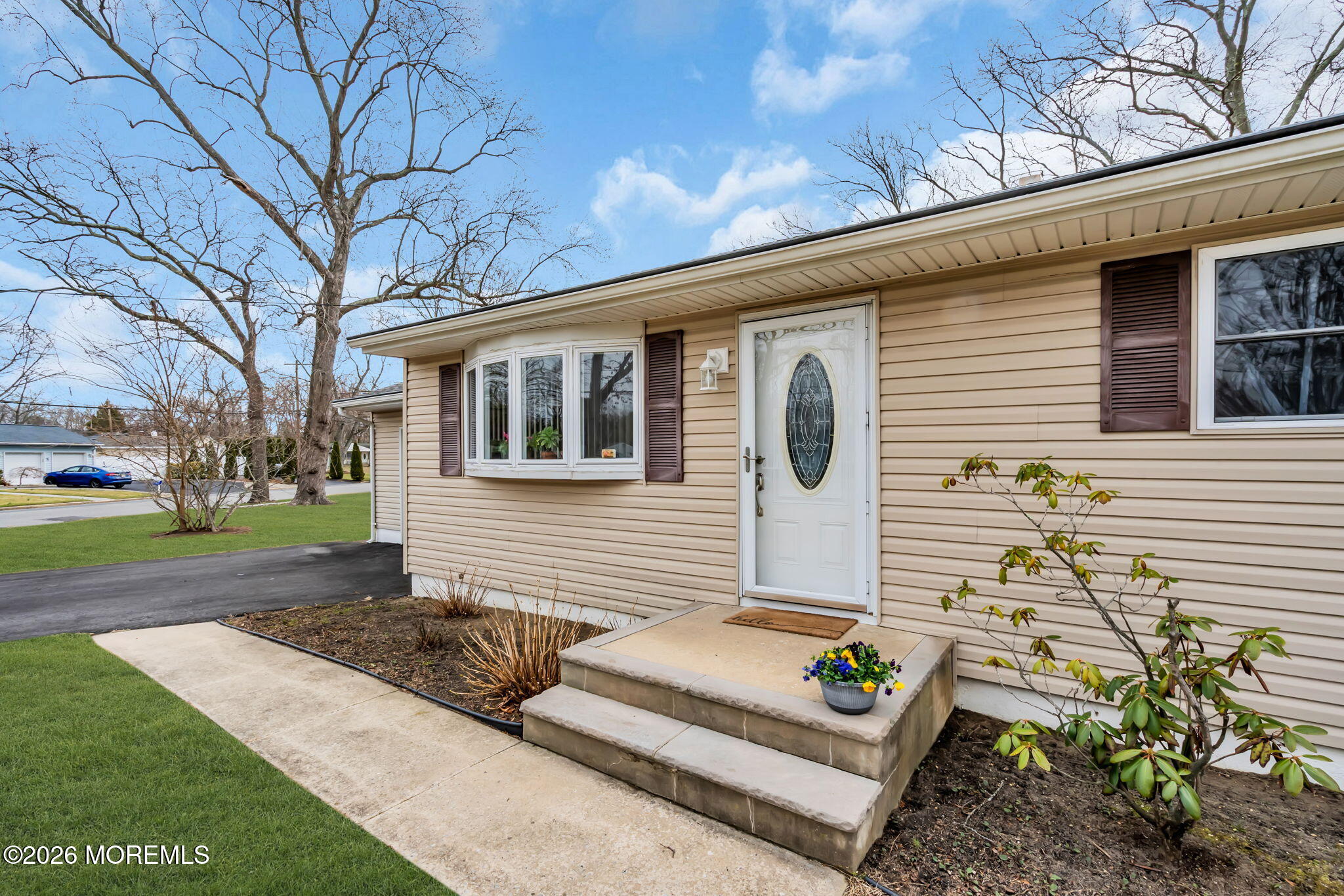26 Clark Drive Howell, NJ 07731 - Photo 3 of 25 a front view of a house with garden