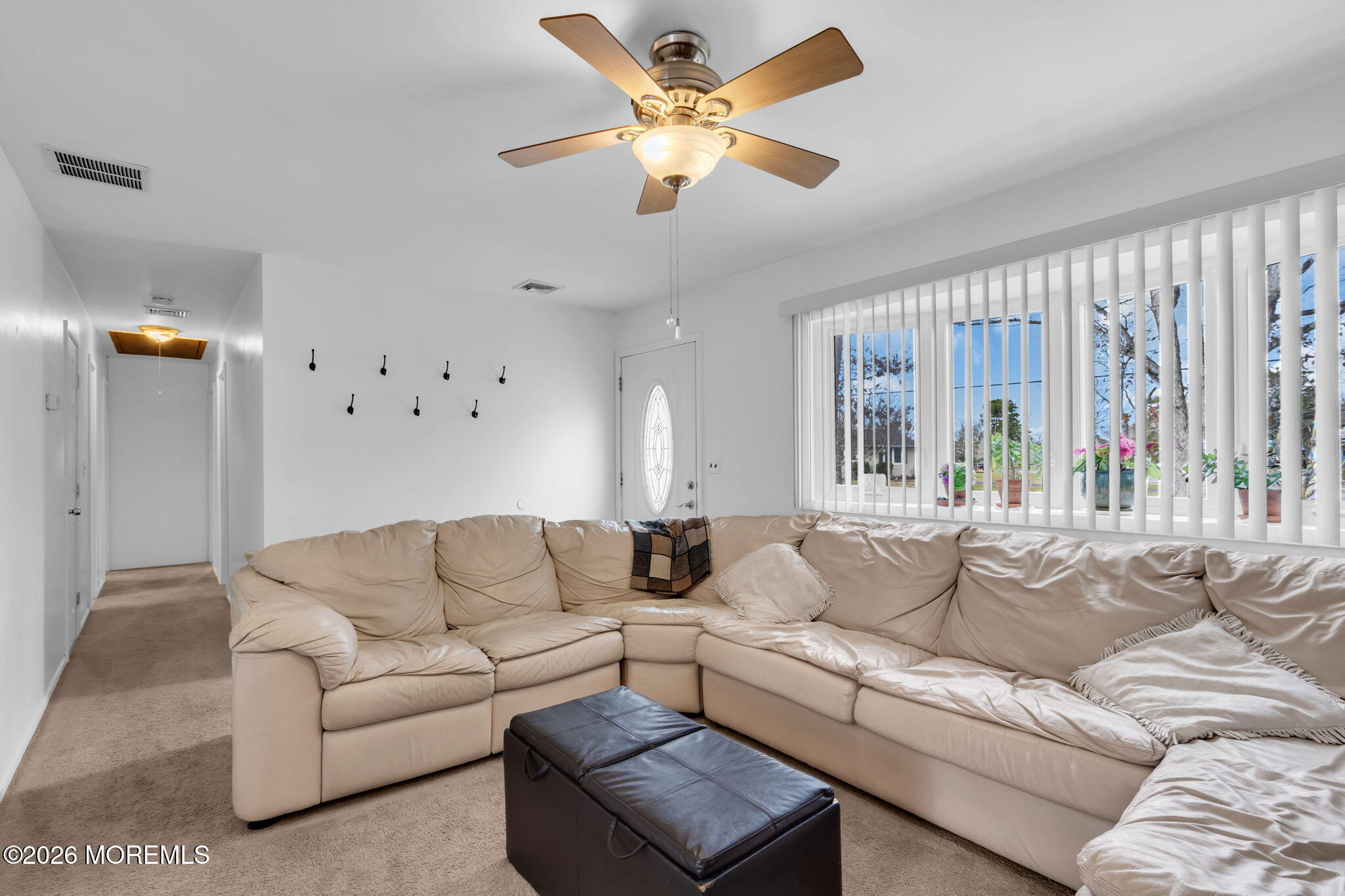 26 Clark Drive Howell, NJ 07731 - Photo 6 of 25 a living room with furniture and a large window