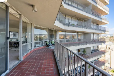 a view of balcony with furniture