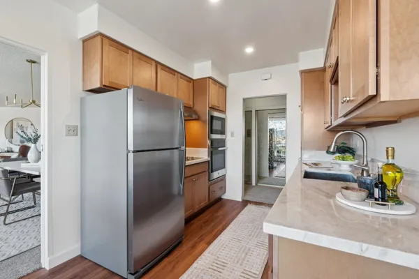 a kitchen with a sink and cabinets