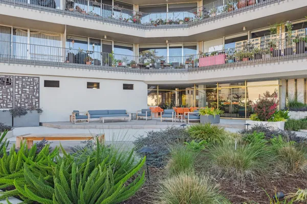 a view of staircase with white walls