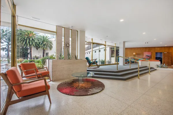 a room with furniture and rug