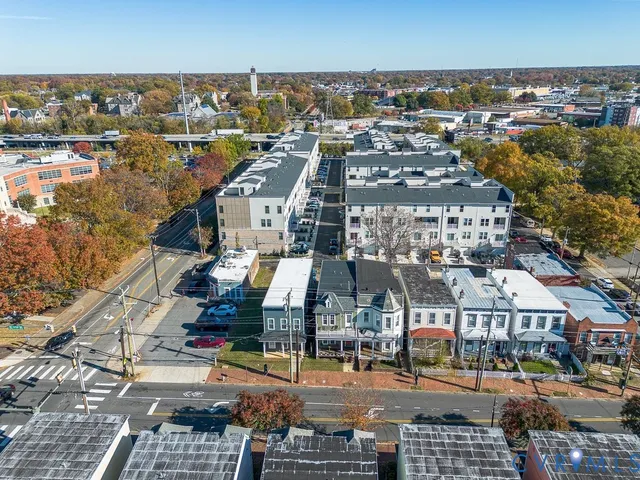an aerial view of a city with lots of residential buildings