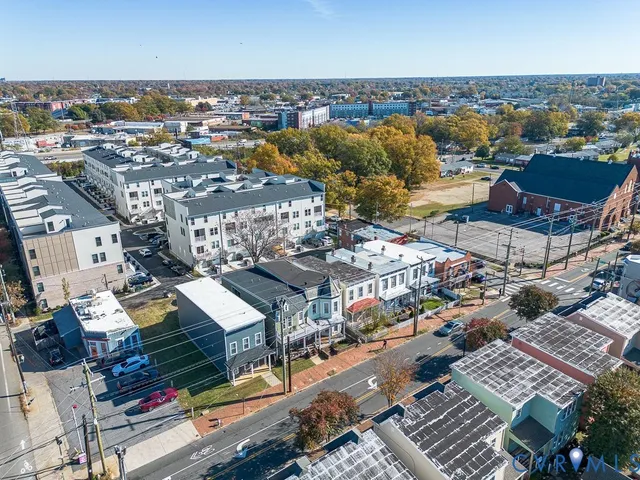 an aerial view of a city with lots of residential buildings