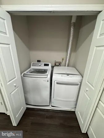a view of a storage & utility room with a sink