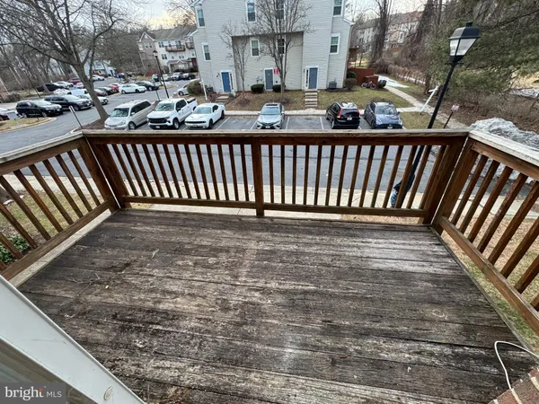 a view of outdoor space with deck and yard