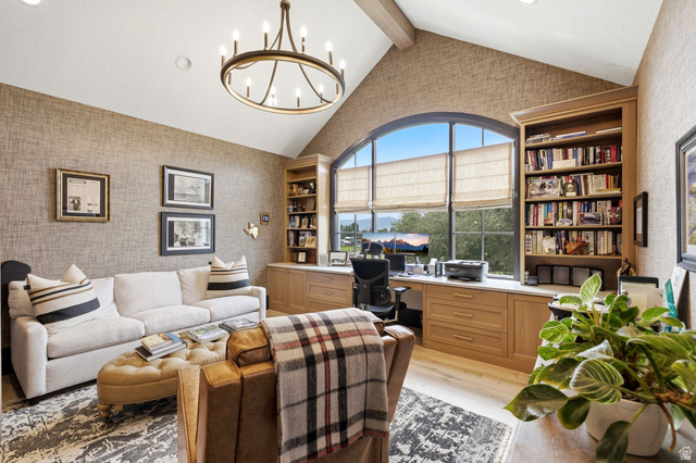 71 Farm Road Midway, UT 84049 - Photo 62 of 92 Room with vaulted ceilings and exposed beam, featuring a large arched window