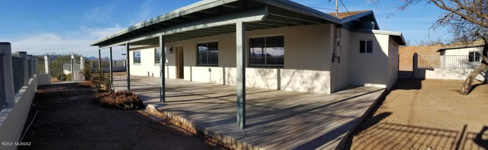 897 Via Savalza Rio Rico, AZ 85648 - Photo 7 of 27 a view of a balcony with chairs