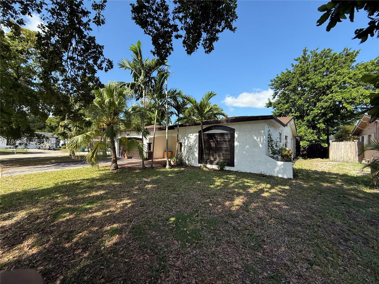 3404 Onyx Road Miramar, FL 33025 - Photo 2 of 6 a view of a house with a yard