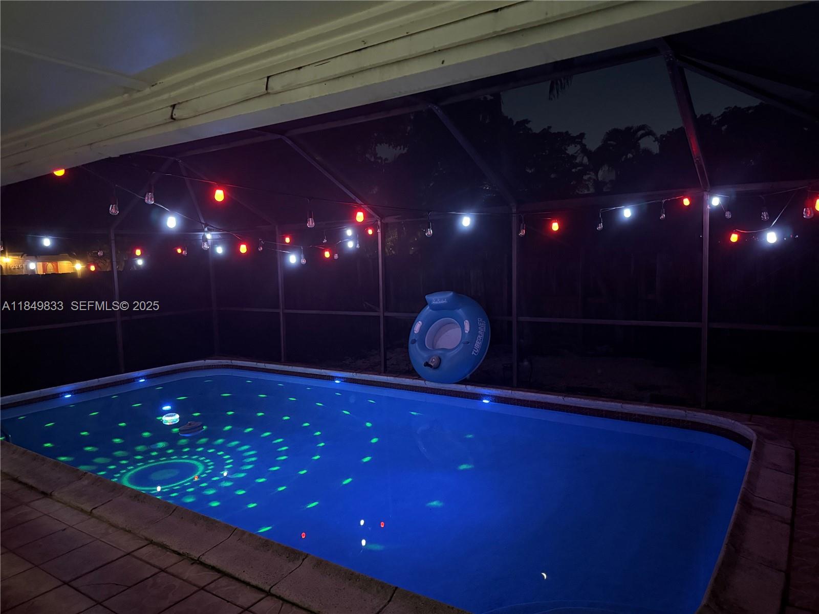 3404 Onyx Road Miramar, FL 33025 - Photo 6 of 6 a bathroom with a sink and a mirror