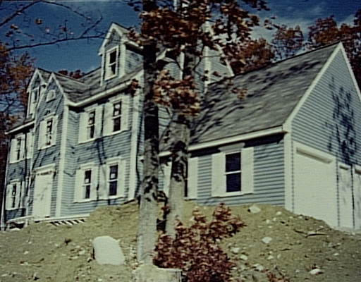 Lot 3 Northwoods Road Groton, MA 01450 - Photo 1 of 1 a front view of a house with a garden