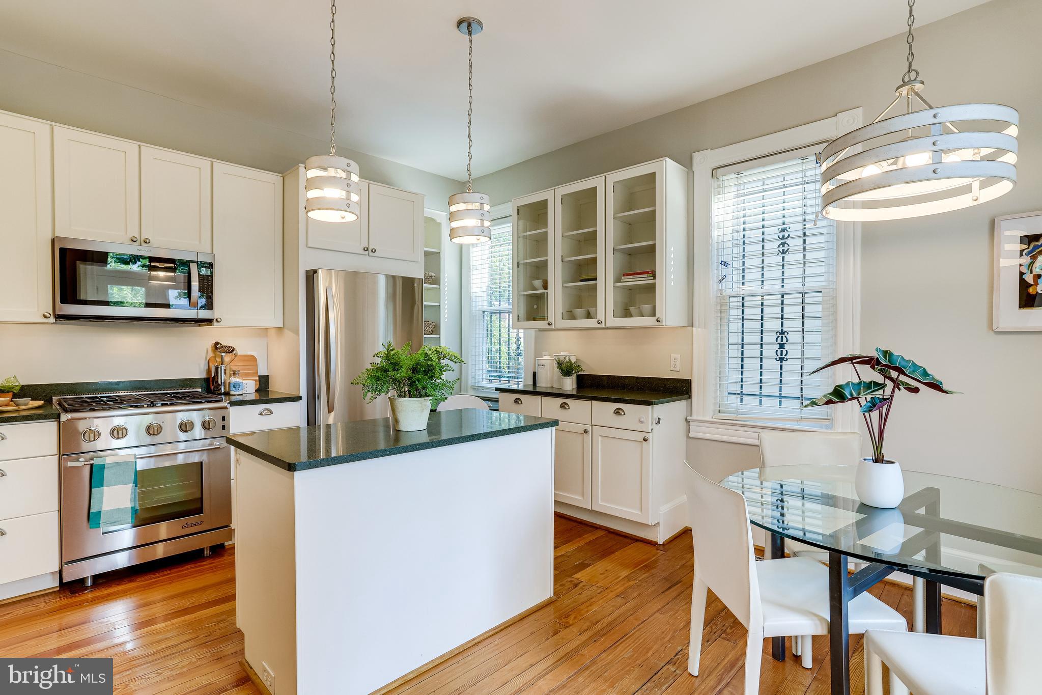 116 9th Street Southeast Washington, DC 20003 - Photo 17 of 56 Kitchen opens to dining area, has 2 windows