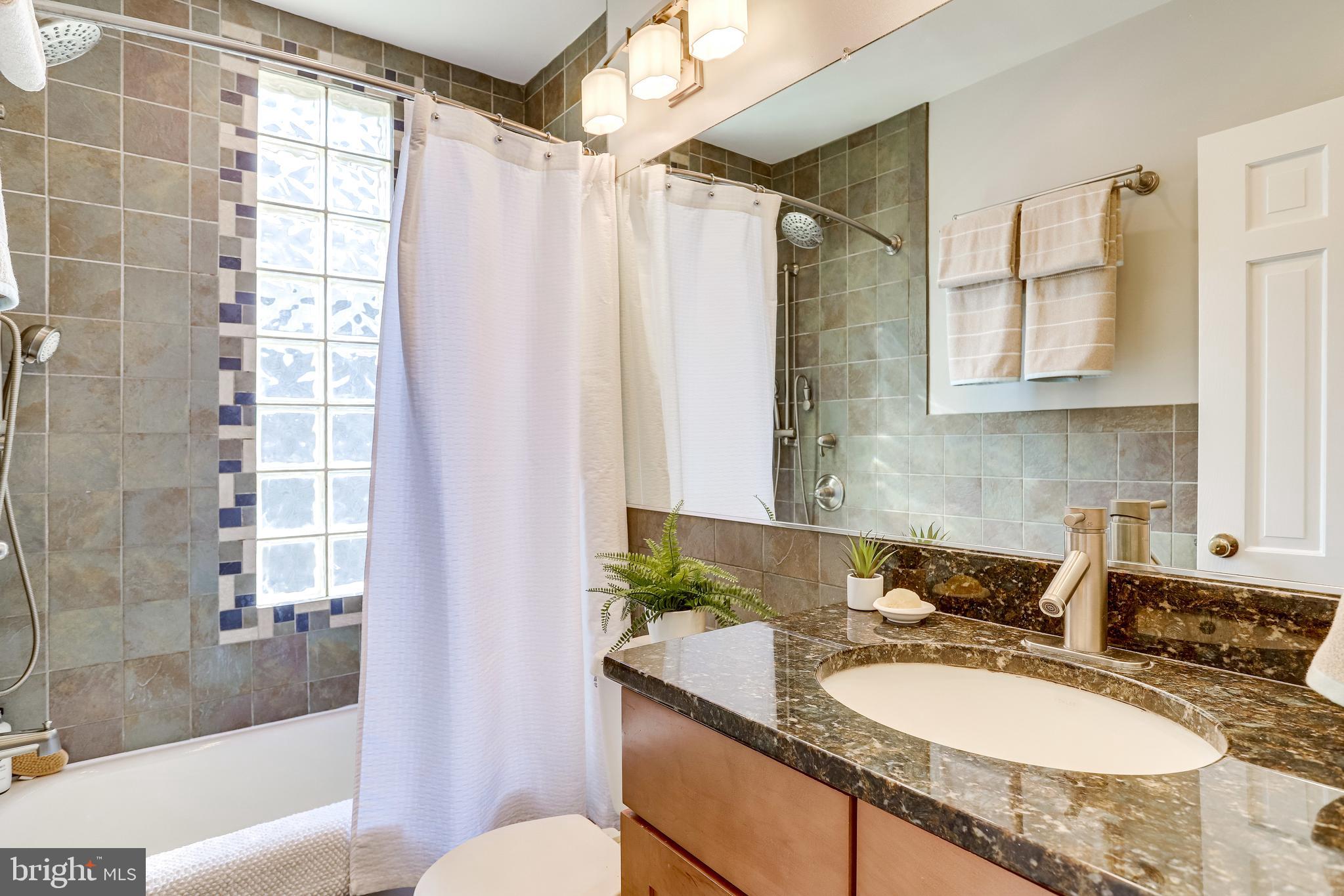 116 9th Street Southeast Washington, DC 20003 - Photo 26 of 56 Full bath in hall upstairs w/granite vanity