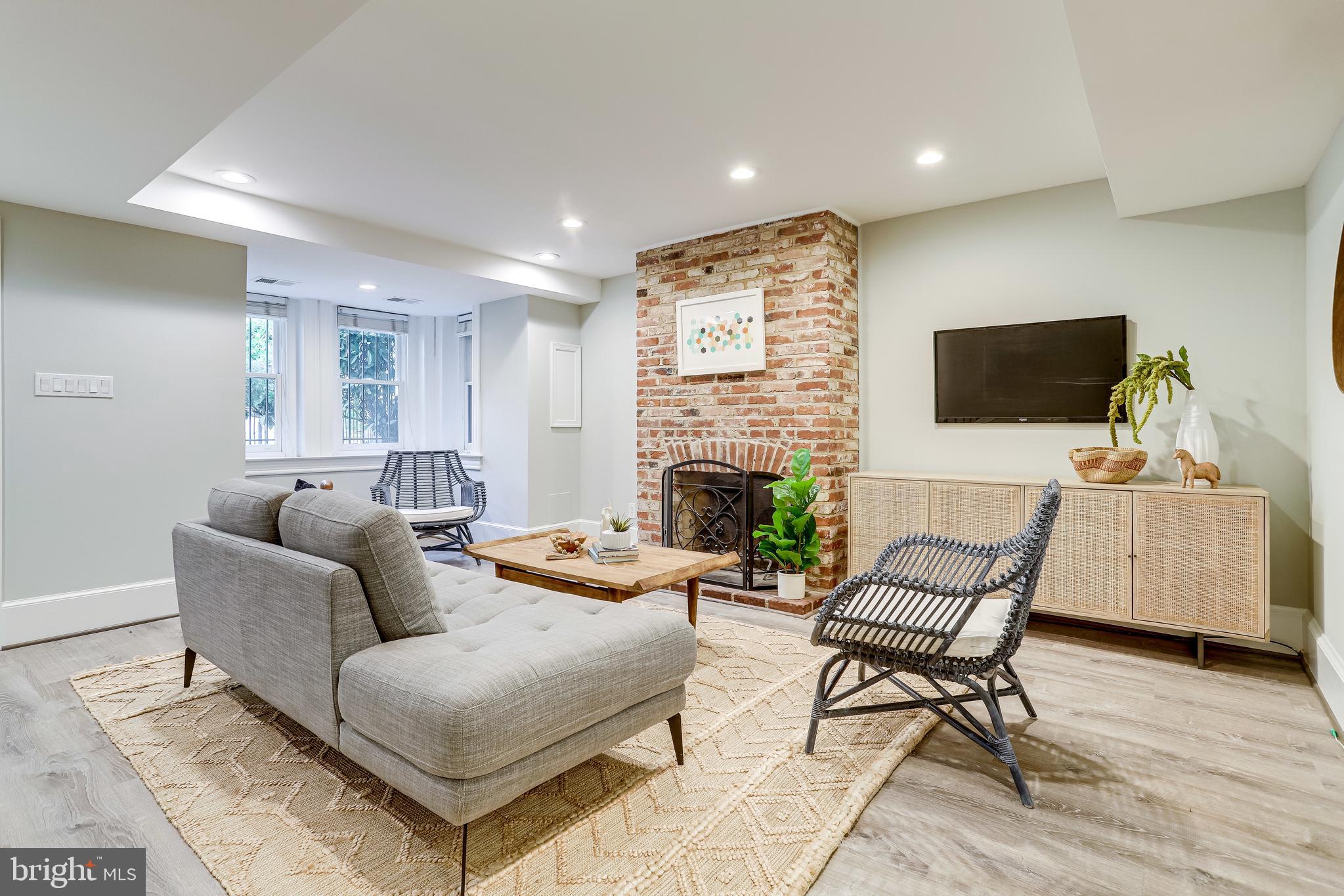 116 9th Street Southeast Washington, DC 20003 - Photo 31 of 56 Snuggle up in front of the fireplace and relax