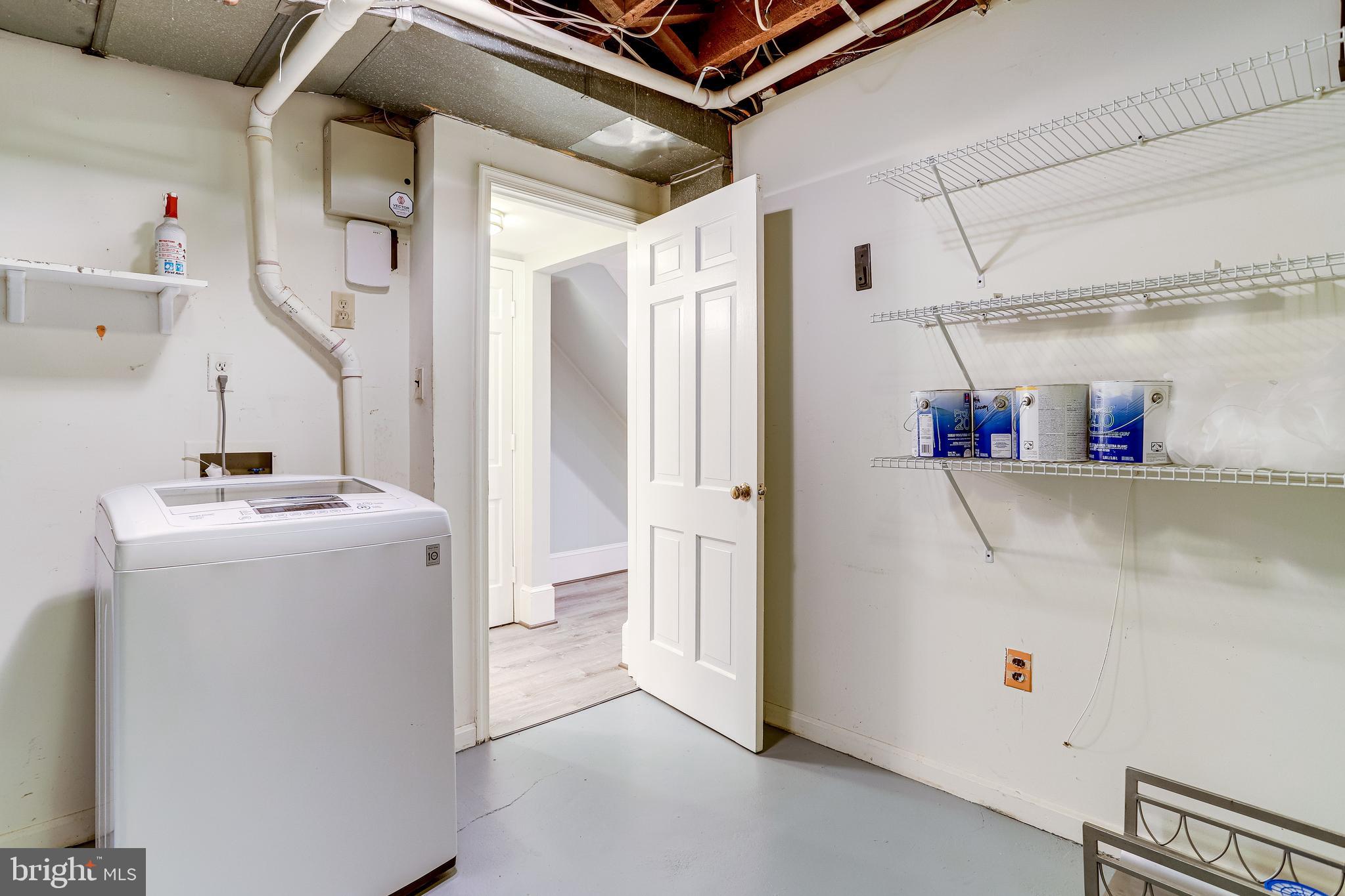 116 9th Street Southeast Washington, DC 20003 - Photo 37 of 56 Full size washer and dryer are in storage room