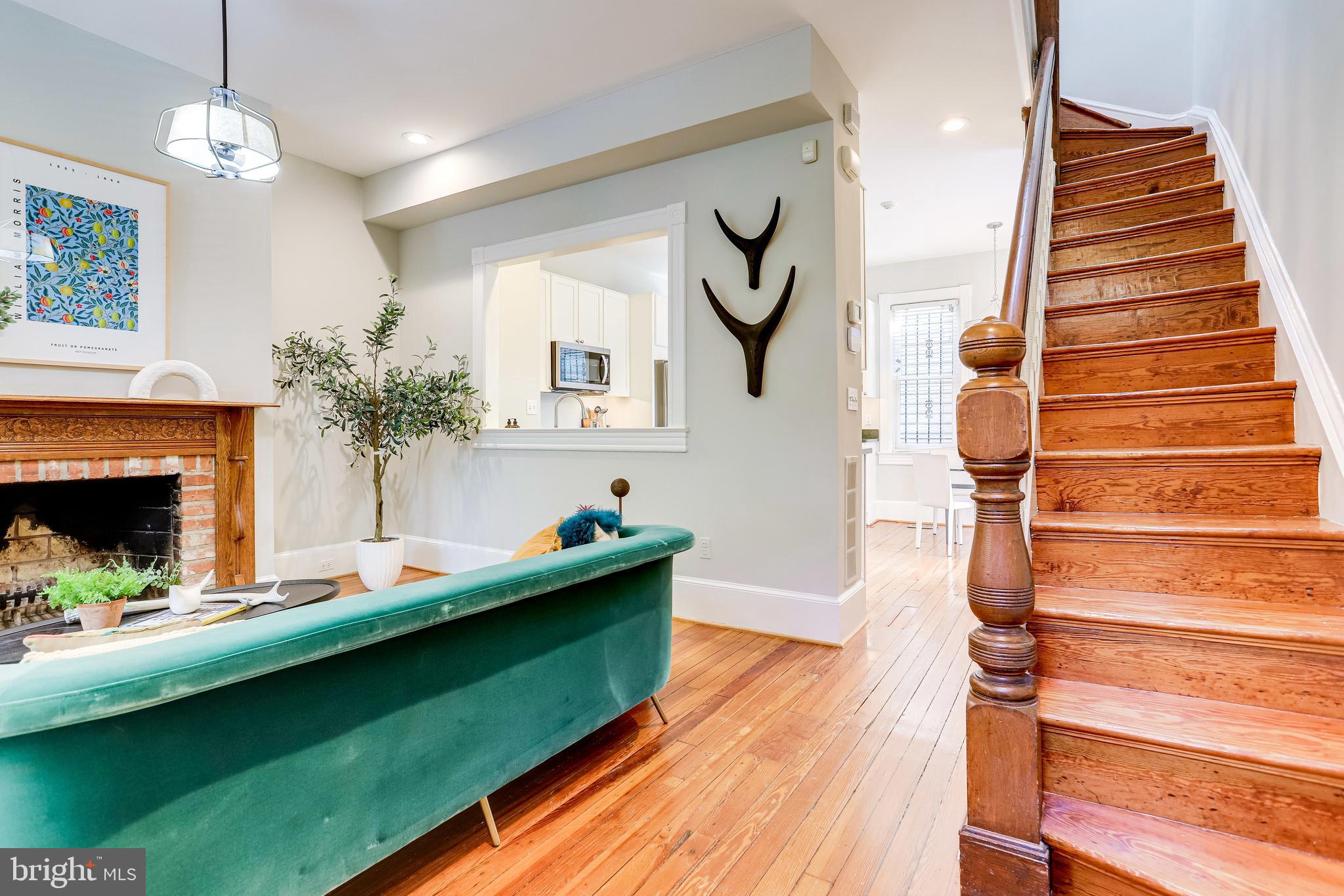 116 9th Street Southeast Washington, DC 20003 - Photo 5 of 56 Bright, open living area w/wood floors