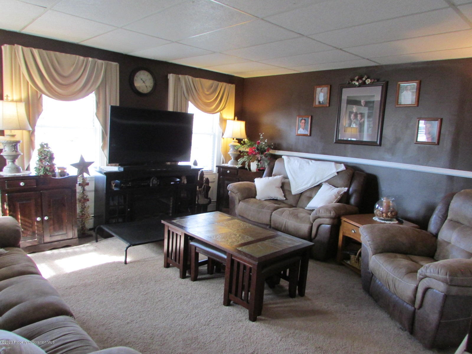 520 Main Street Great Bend, PA 18821 - Photo 18 of 34 a living room with furniture and a flat screen tv