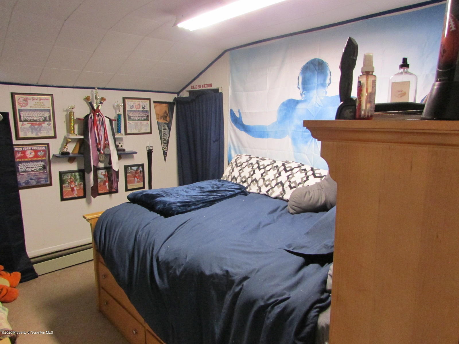 520 Main Street Great Bend, PA 18821 - Photo 27 of 34 a bedroom with a bed and a mirror