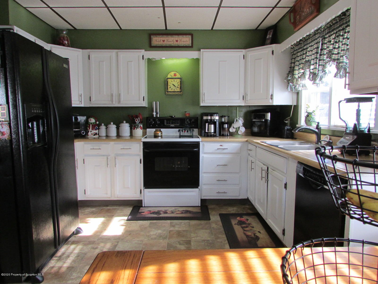 520 Main Street Great Bend, PA 18821 - Photo 3 of 34 a kitchen with a sink cabinets and stainless steel appliances
