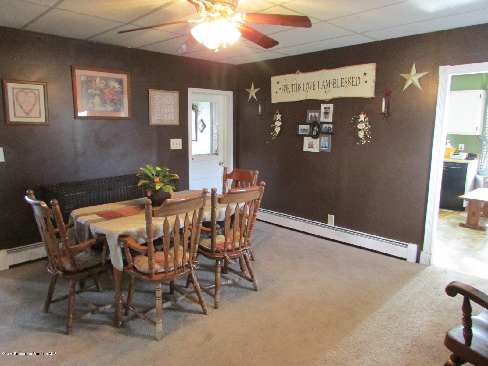 520 Main Street Great Bend, PA 18821 - Photo 9 of 34 a dining room with furniture and chandelier
