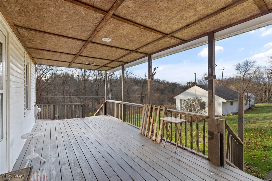 102 Potrock Road Wellsburg, WV 26070 - Photo 32 of 42 Deck with a yard