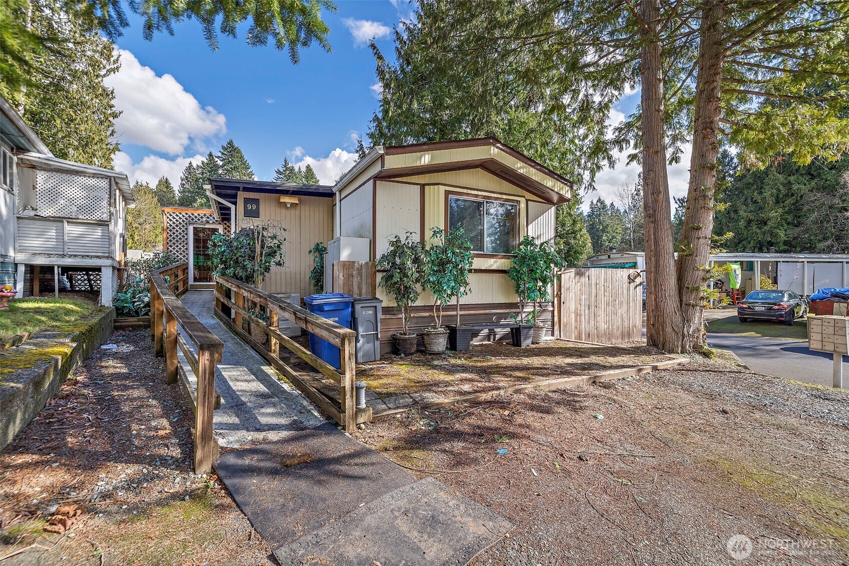 3333 228th Street Southeast, Unit 99 Bothell, WA 98021 - Photo 1 of 27 a house view with a outdoor space
