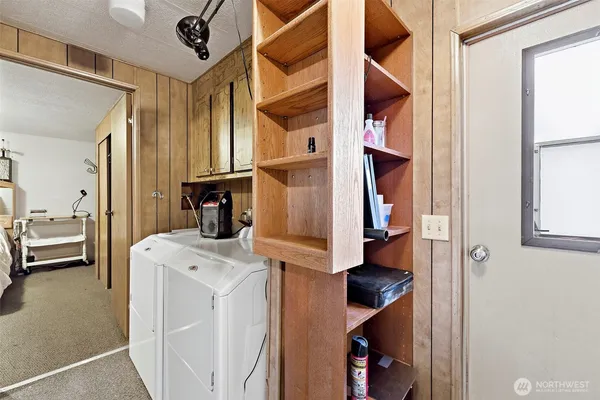 a view of walk in closet with window