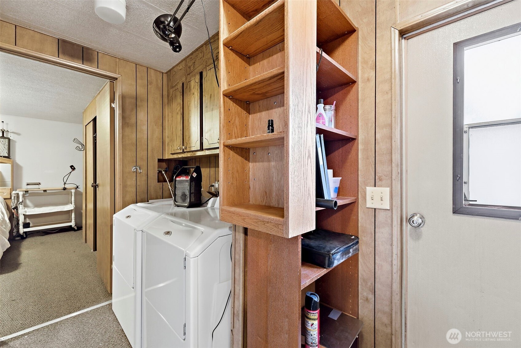 3333 228th Street Southeast, Unit 99 Bothell, WA 98021 - Photo 15 of 27 a view of walk in closet with clothes and shoes