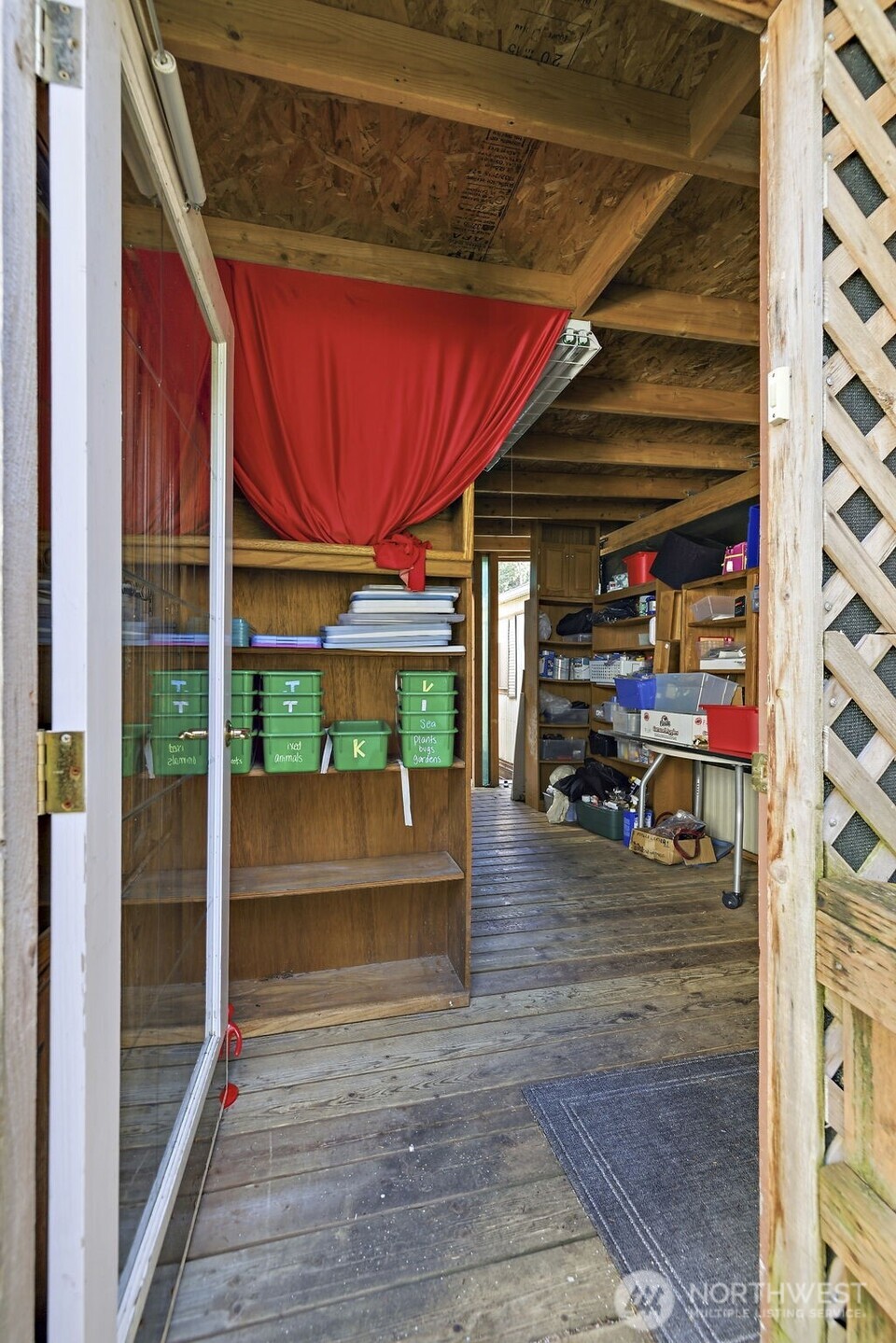 3333 228th Street Southeast, Unit 99 Bothell, WA 98021 - Photo 3 of 27 a view of a porch with table and chairs