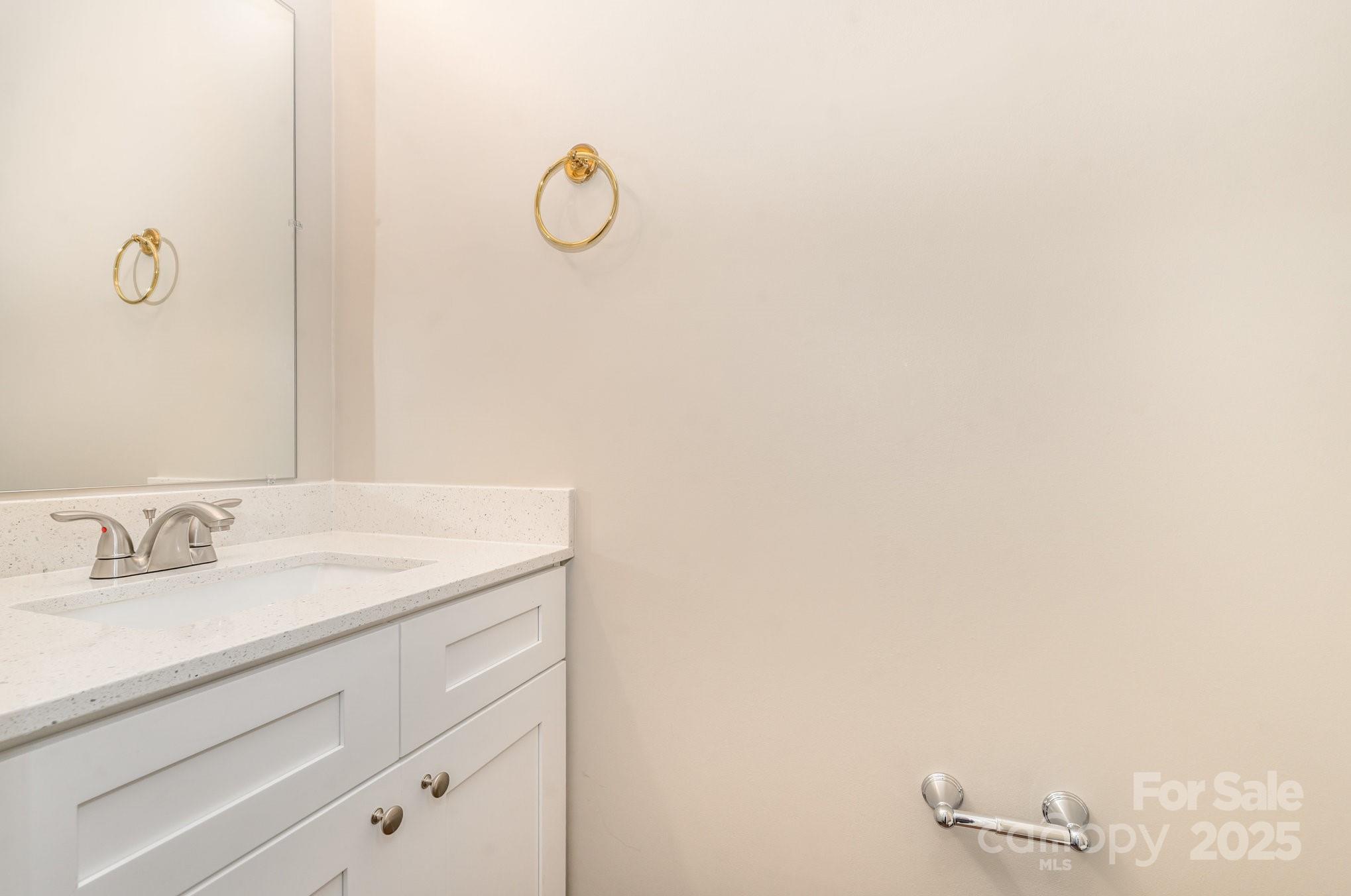 7527 Henderson Park Road Huntersville, NC 28078 - Photo 13 of 18 a bathroom with a sink and vanity