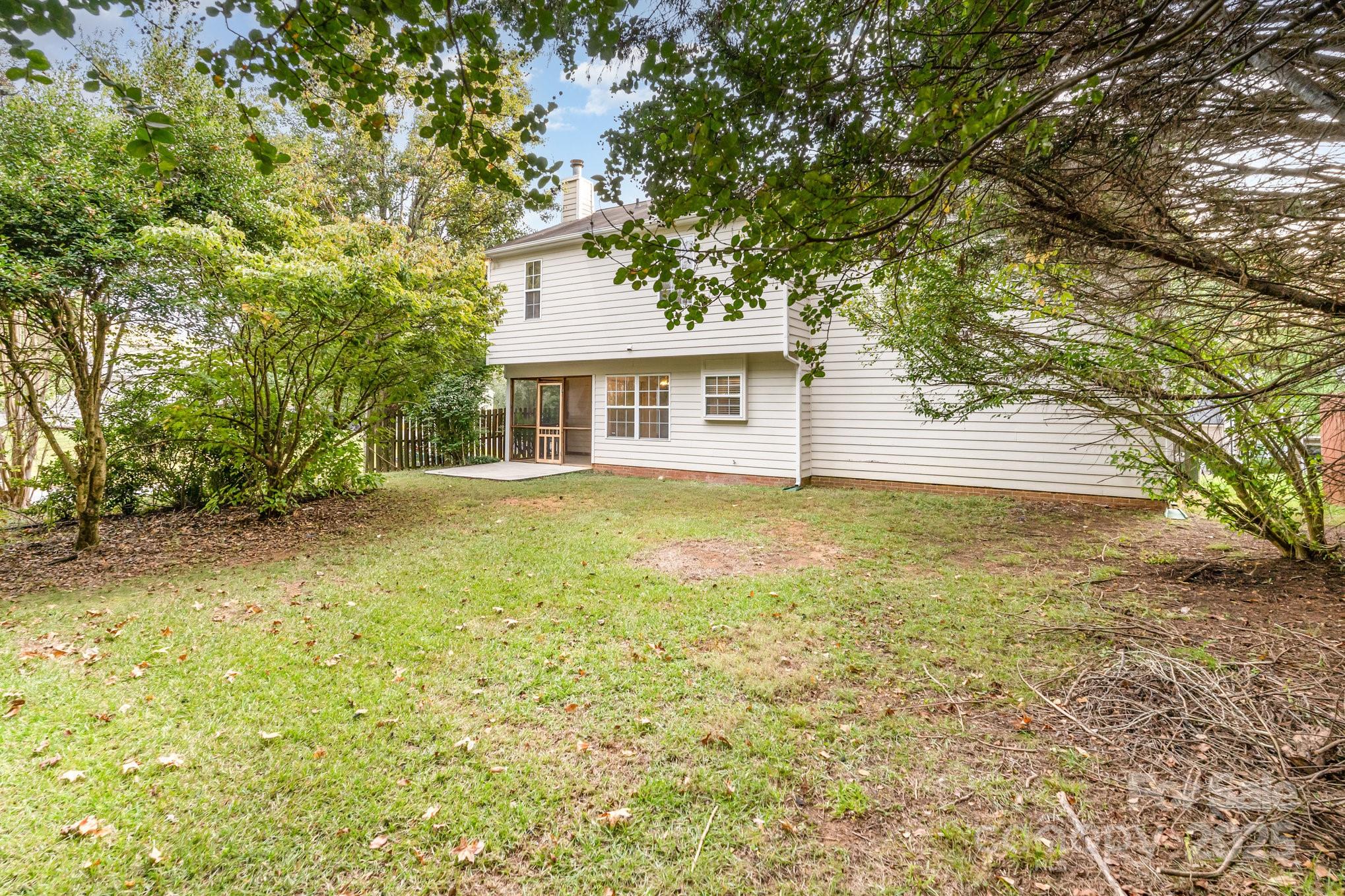 7527 Henderson Park Road Huntersville, NC 28078 - Photo 17 of 18 a house view with a garden space